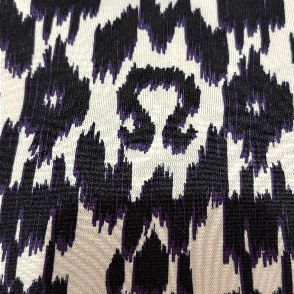 Lululemon tank top. No tag. Measures a size 4. White,black and purple. - Picture 4 of 7